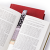 Resketch Bookmark made from 100% Reclaimed and rescued paper marking an open page in a book.