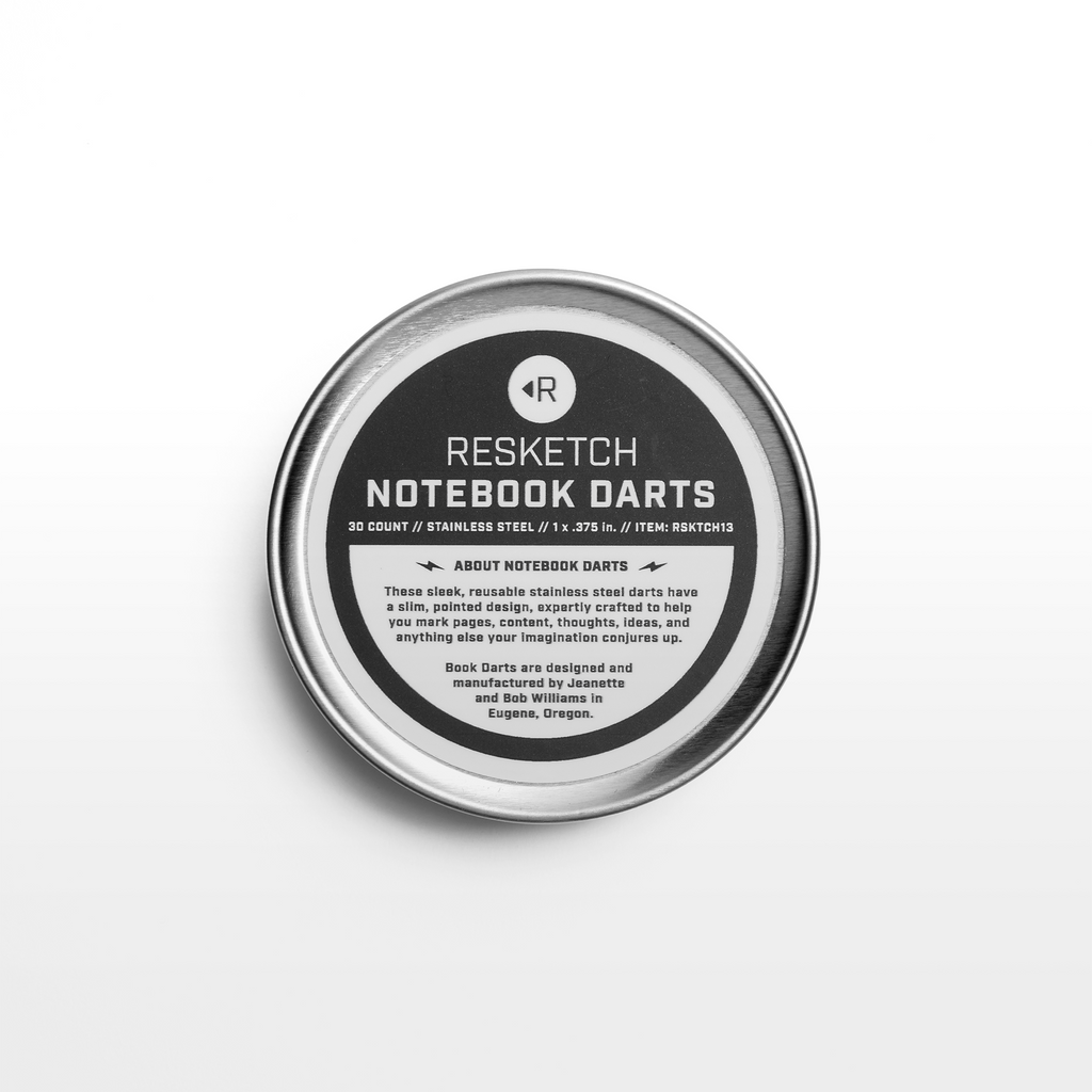 The back side of the aluminum tin of Resketch Notebook Darts showing the back label
