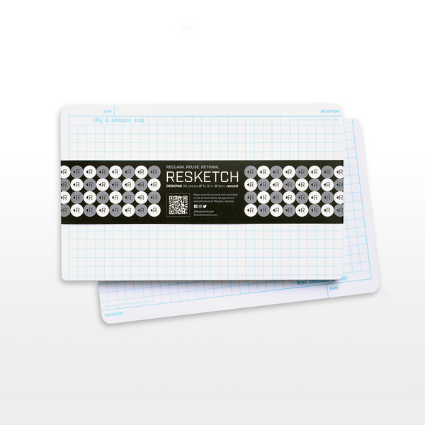 Resketch Desk pad two pack. Made from 100% Reclaimed, rescued, and upcycled paper with branded black, white, and grey ero waste label.